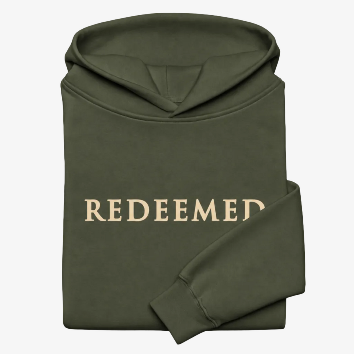 An olive green folded hoodie with the word 'REDEEMED' printed in a light beige serif font across the chest, displayed against a solid black background.