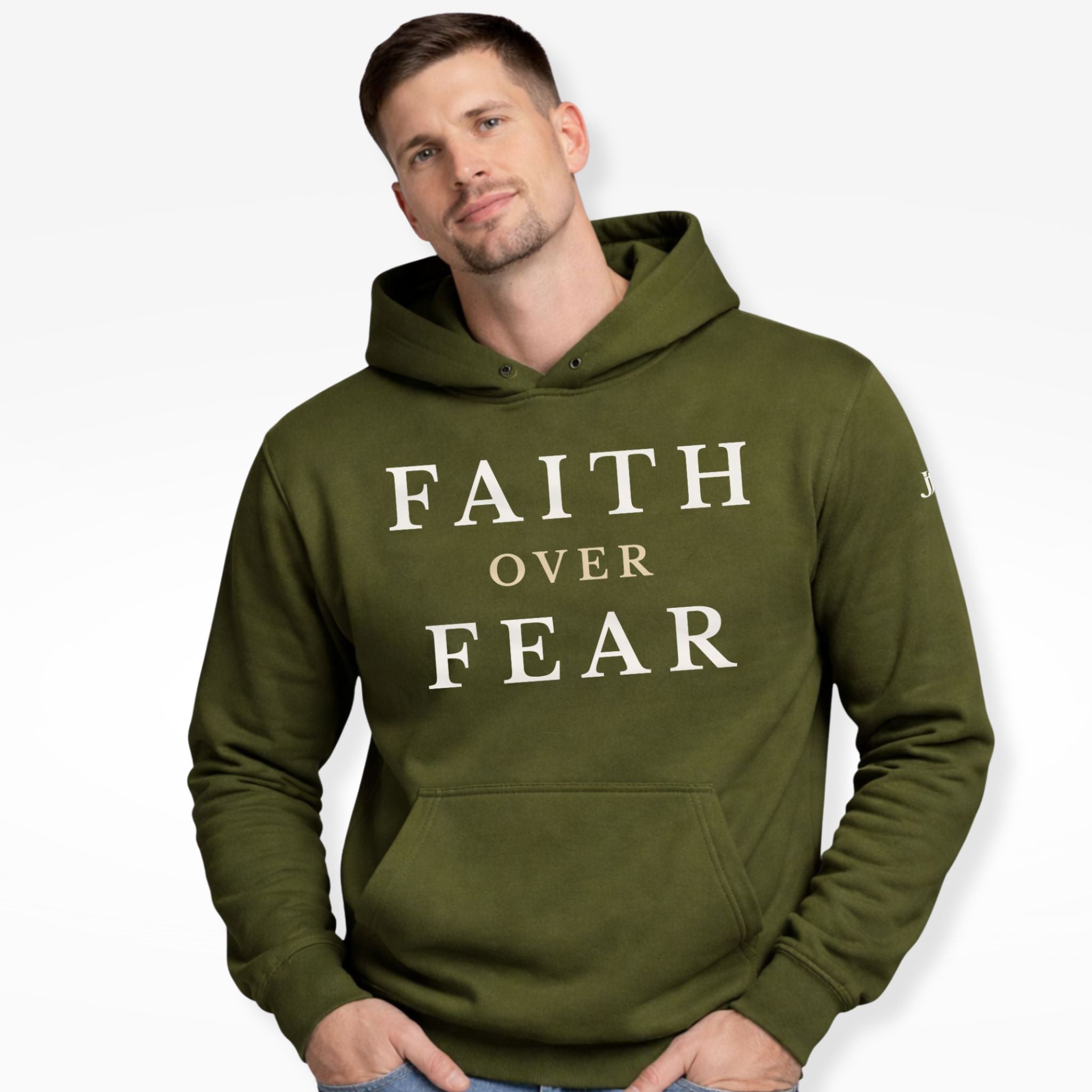 Man wearing a green hoodie with 'FAITH OVER FEAR' text on a white background