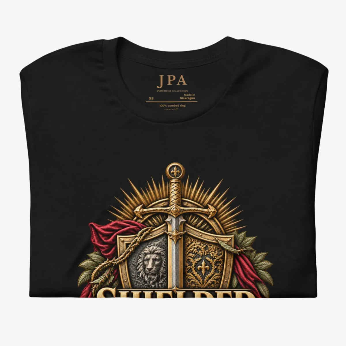 A black short-sleeve t-shirt with a detailed graphic print on the front. The graphic features a golden sword piercing a shield, flanked by a lion head and ornate gold details, with red draped fabric accents.