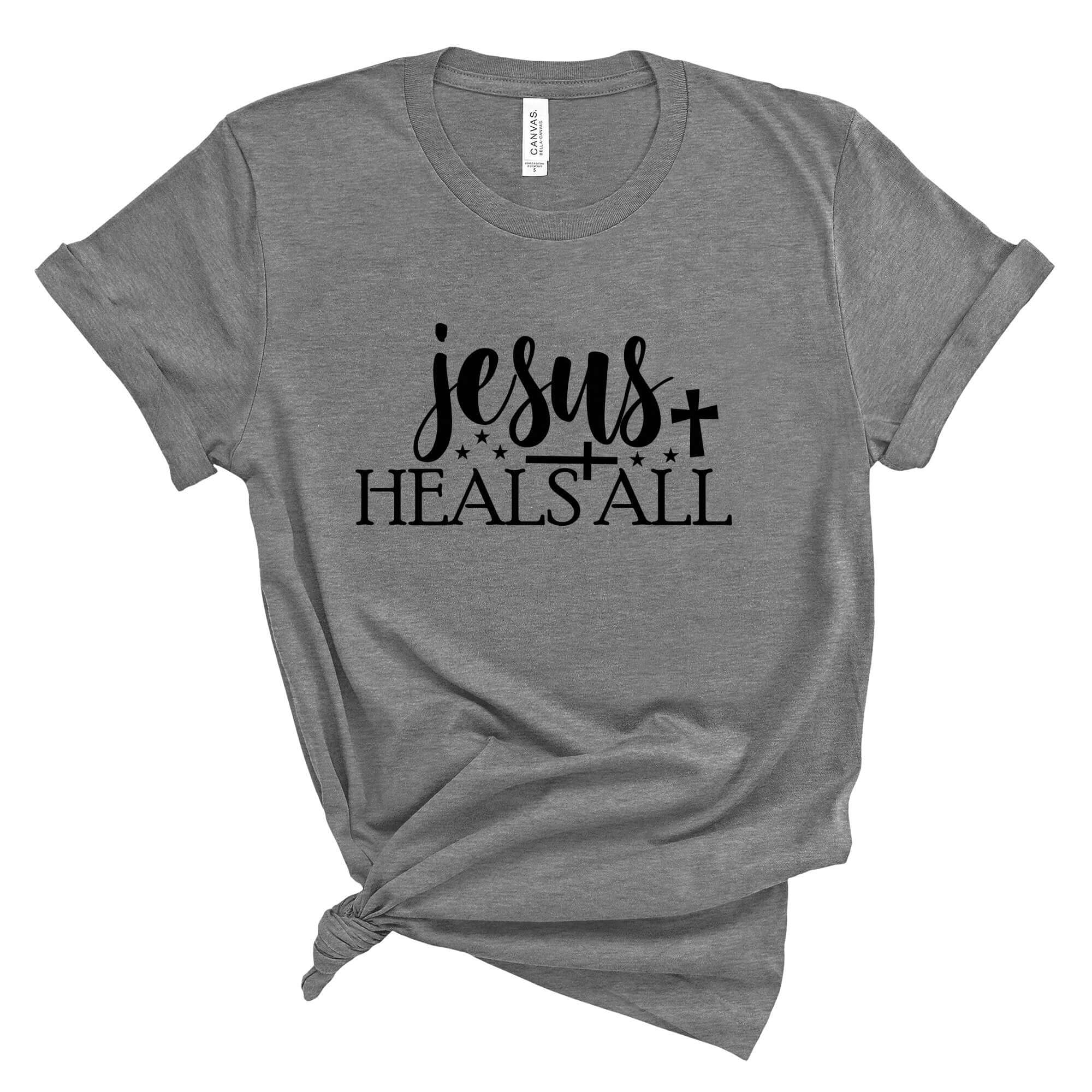 T-Shirts & TopsEmbrace your faith with this inspiring "Jesus Heals All" T-shirt. Featuring elegant calligraphy and symbolic stars and cross, this shirt is perfect for everyday wear or special church events. It's designed to offer comfort while expressing