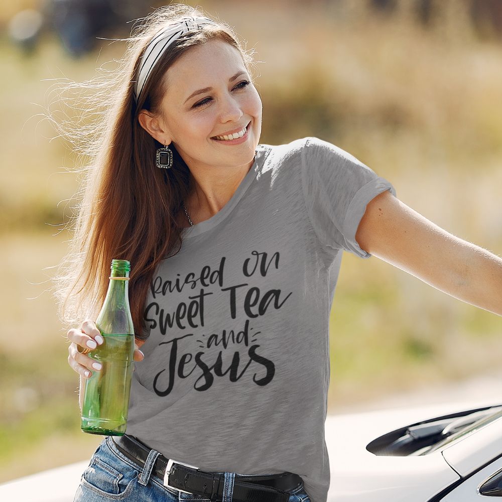 Raised on Sweet Tea and Jesus Women's Relaxed-Fit Scoop Neck T-Shirt Size: XS Color: Heather White Jesus Passion Apparel