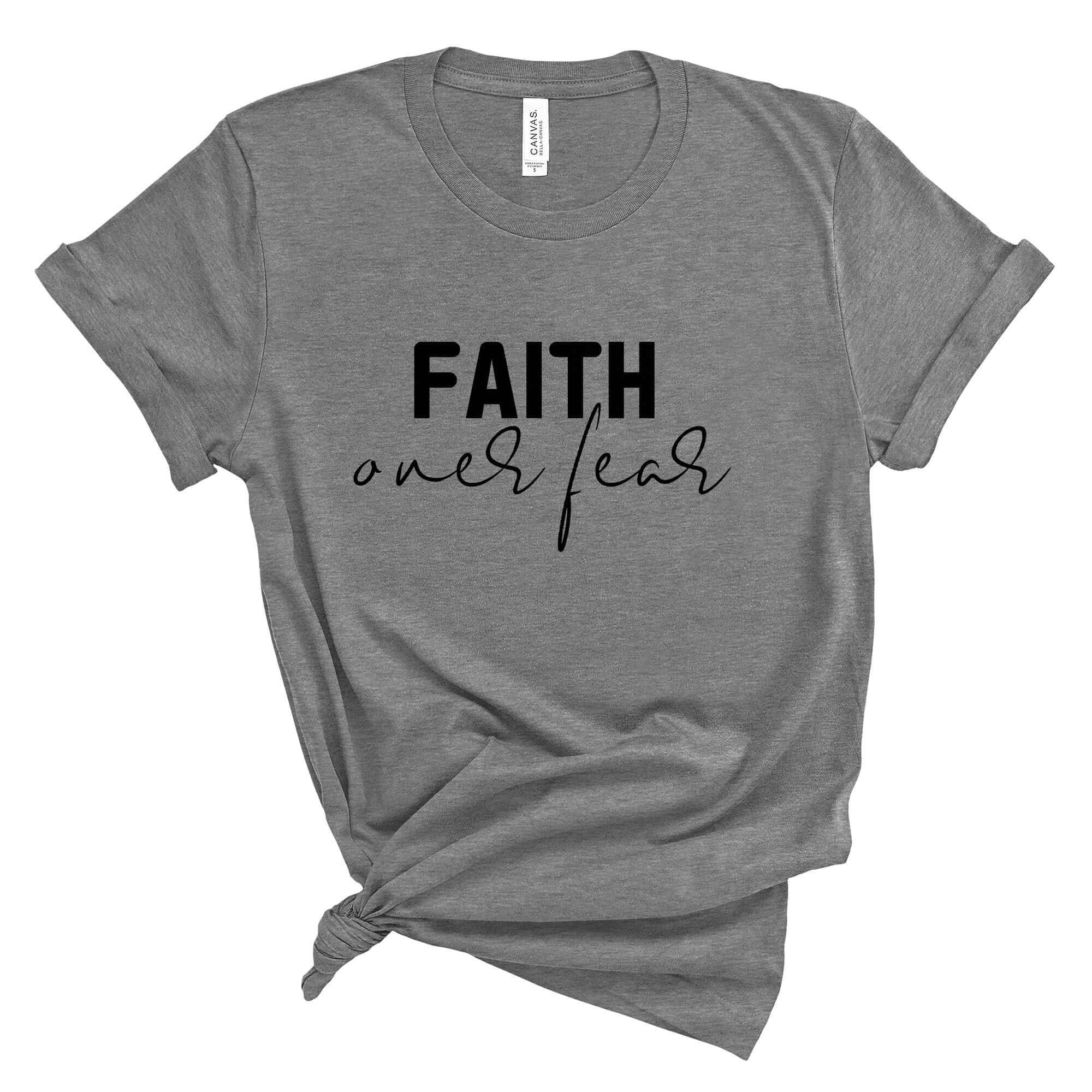 Faith Over Fear Women's Short Sleeve TeeEmbrace a message of positivity and boldness with this stylish "Faith Over Fear" T-shirt. Crafted for comfort and durability, this tee features a minimalist design with the inspiring phrase "Faith over fear" in an e
