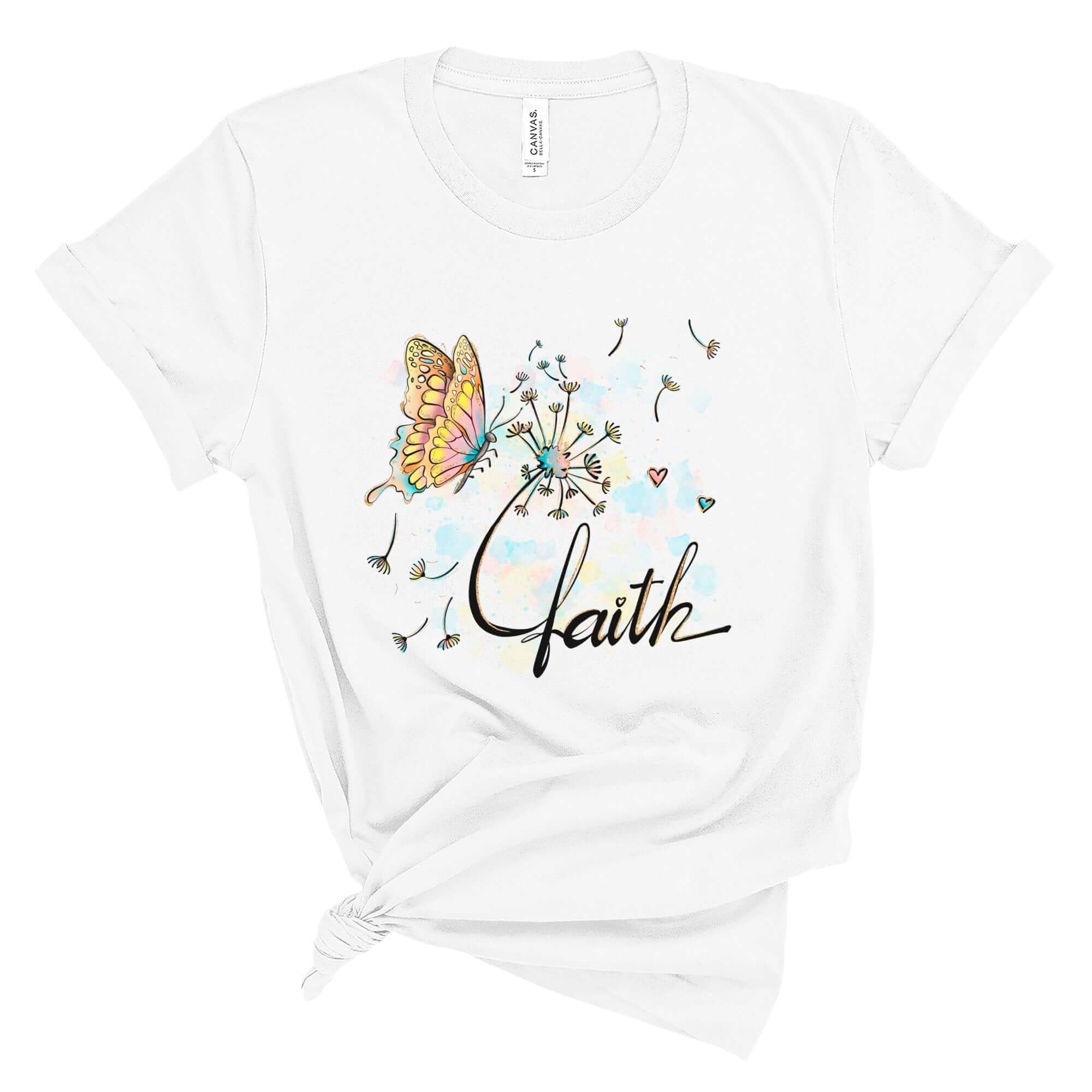 T-Shirts & TopsElevate your wardrobe with this beautifully artistic T-shirt featuring a delicately illustrated butterfly and dandelion with whimsical watercolor accents. The word "faith" is elegantly scripted, adding a touch of inspiration to your day. Pe