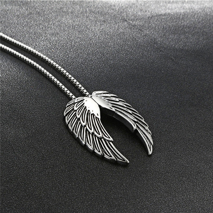 Angel Wing Feather Pendant Necklace Color: Silver Jesus Passion Apparel