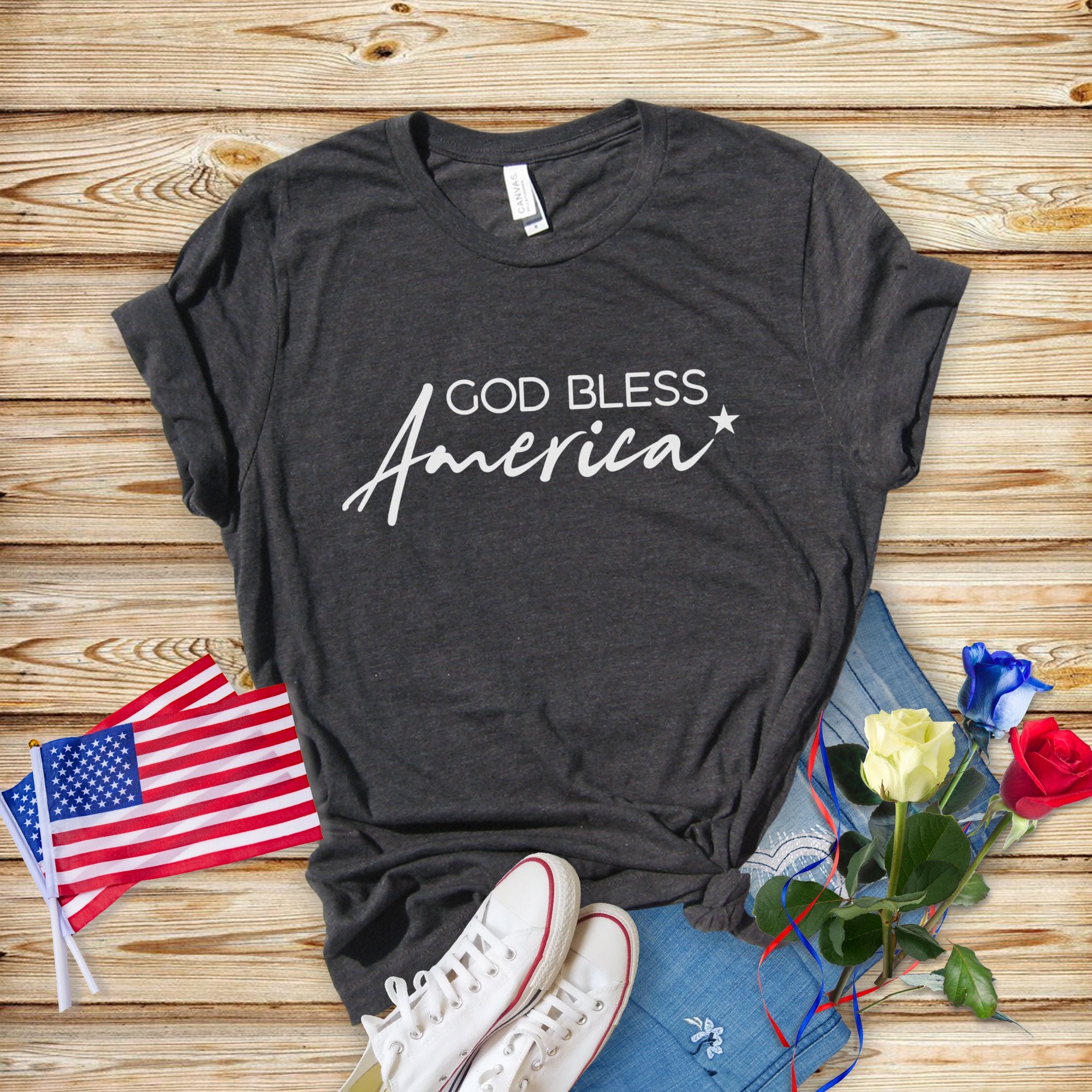 God Bless America Star Women's Short Sleeve T-shirt Size: XS Color: Solid Black Blend Jesus Passion Apparel