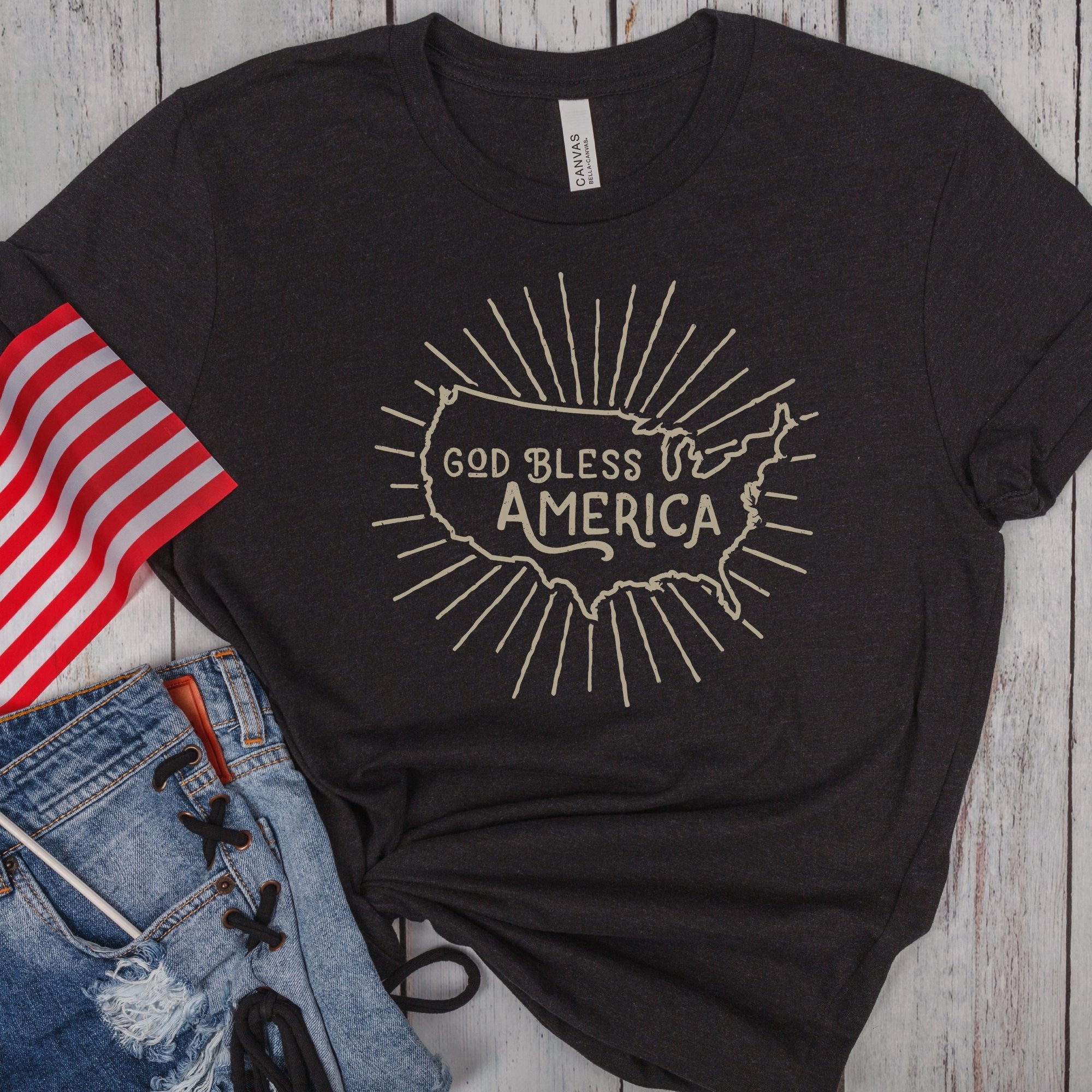 God Bless America Women's Short Sleeve Patriotic T-shirt Size: XS Color: Solid Black Blend Jesus Passion Apparel