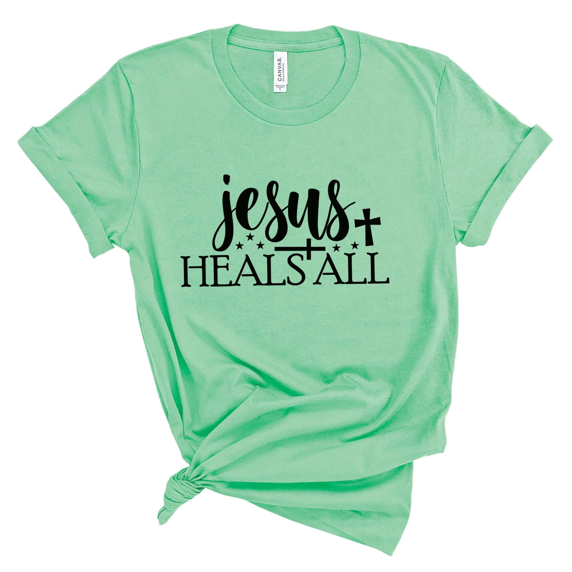 T-Shirts & TopsEmbrace your faith with this inspiring "Jesus Heals All" T-shirt. Featuring elegant calligraphy and symbolic stars and cross, this shirt is perfect for everyday wear or special church events. It's designed to offer comfort while expressing