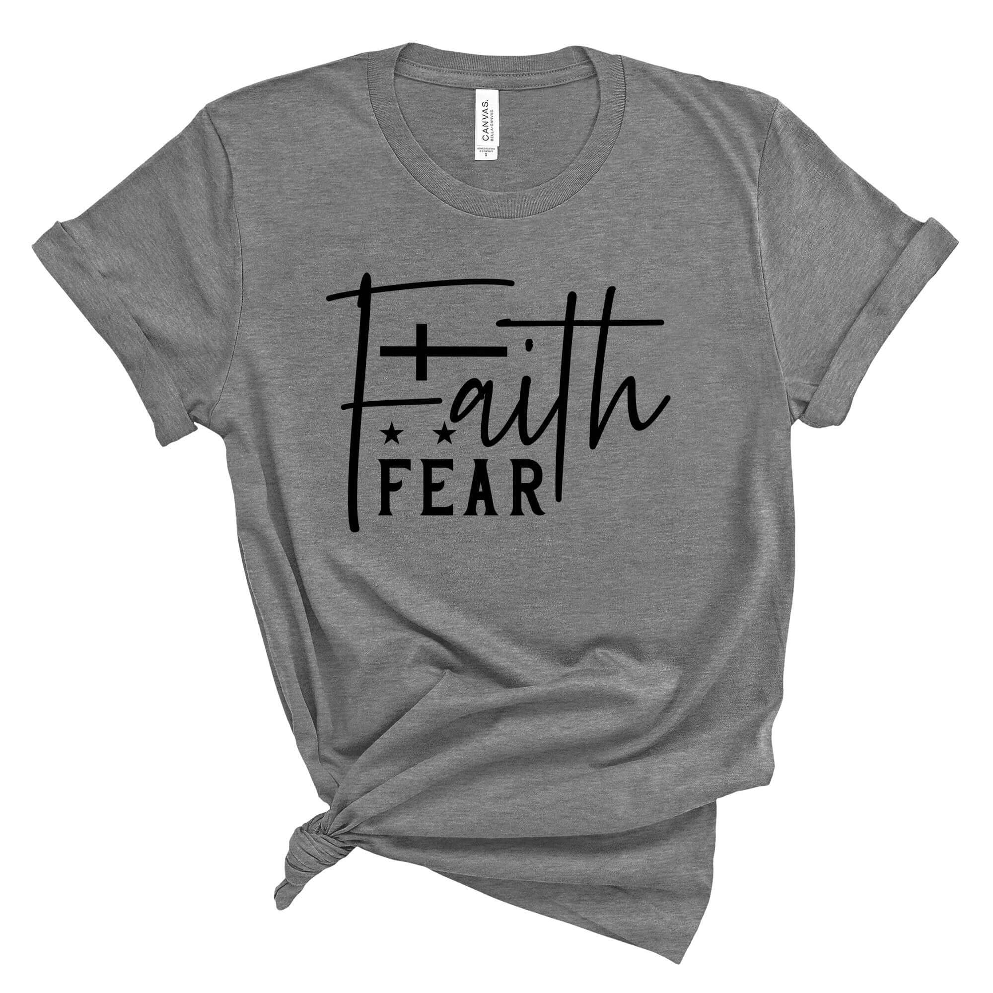 T-Shirts & TopsEnhance your wardrobe with this stylish and meaningful T-shirt featuring the powerful message "Faith Over Fear" in a chic handwritten script. Perfect for daily wear, it offers both comfort and inspiration. The minimalist design with a beaut