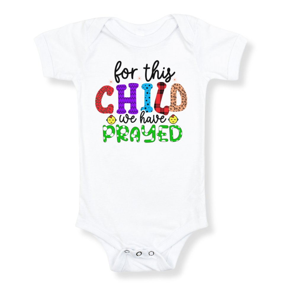 For This Child We Have Prayed Multi-Pattern Baby Bodysuit Color: White Size: 3-6m Jesus Passion Apparel