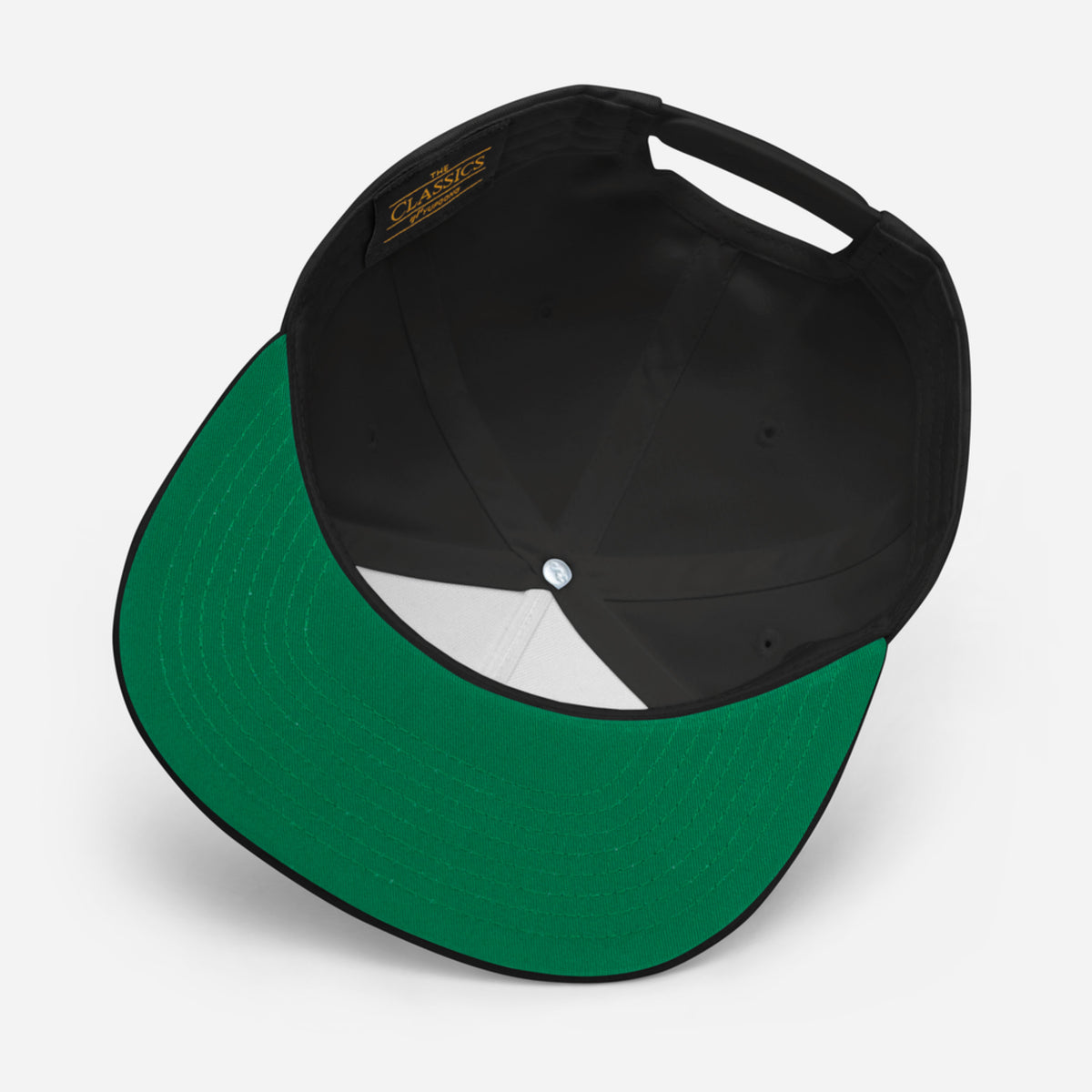 Black and green cap on a white background