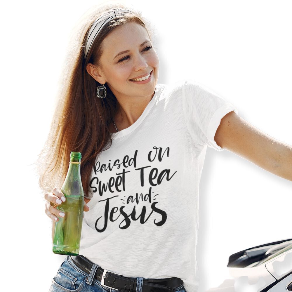 Raised on Sweet Tea and Jesus Women's Relaxed-Fit Scoop Neck T-Shirt Size: XS Color: Heather White Jesus Passion Apparel