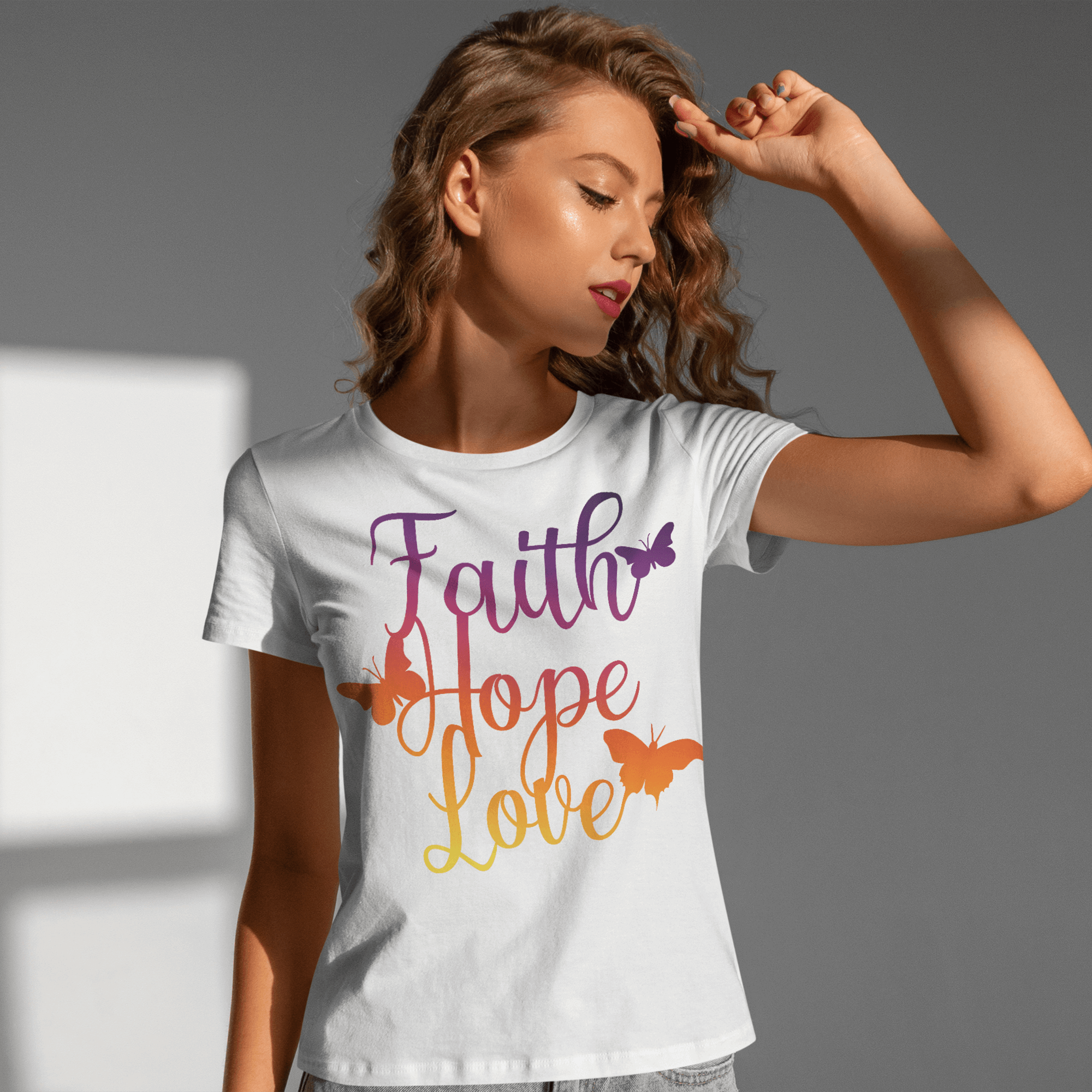 T-Shirts & TopsEmbrace a positive message with this vibrantly colored "Faith Hope Love" T-shirt, adorned with elegant butterflies. The rich gradients and inspirational words provide a daily dose of motivation, perfect for casual wear or as a thoughtful gi