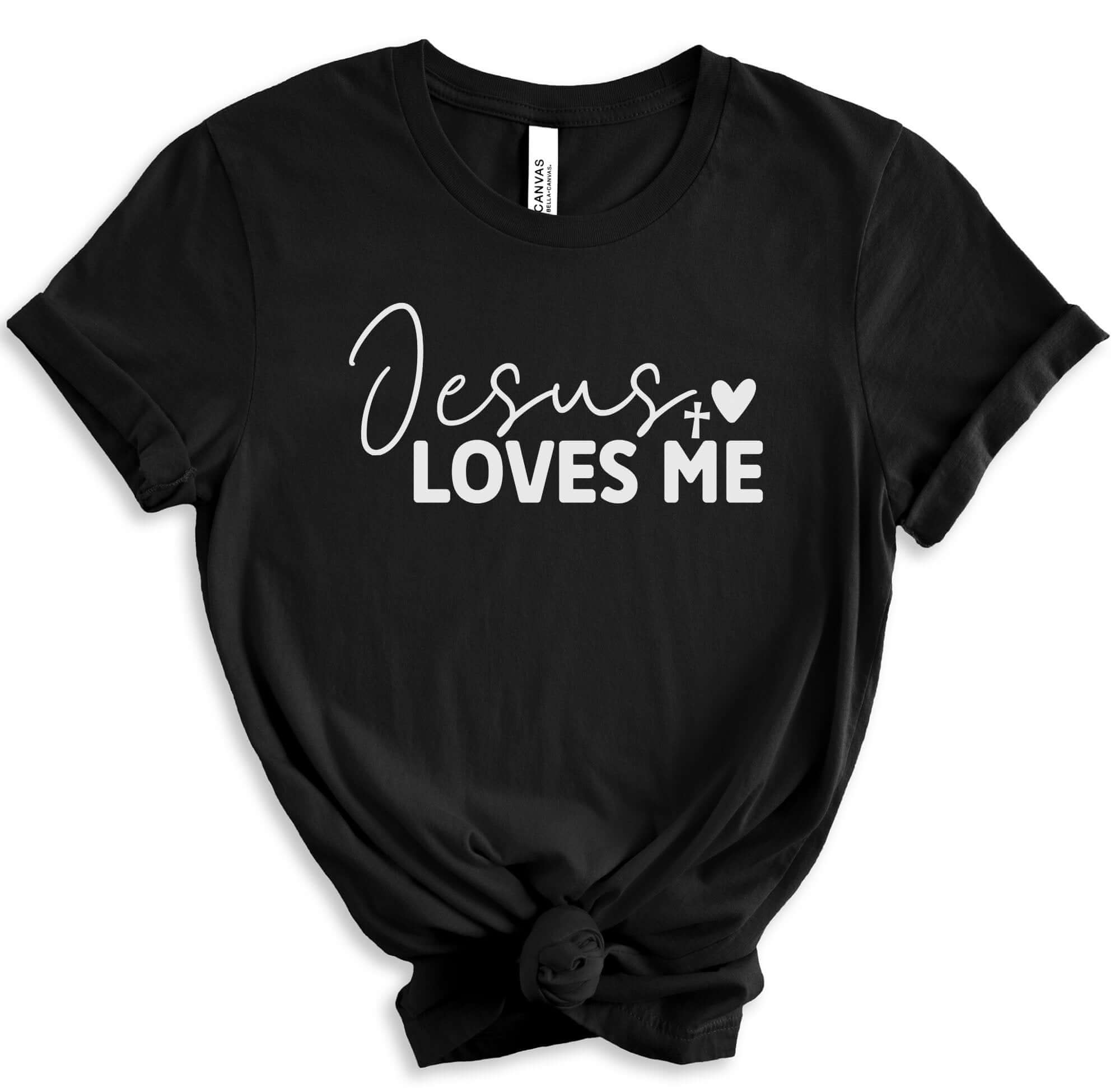 T-Shirts & TopsCelebrate your faith with this beautifully designed T-shirt featuring the inspiring message "Jesus Loves Me" in elegant script. Perfect for casual wear or group events, this shirt is a great way to spread a message of love and faith. Made f