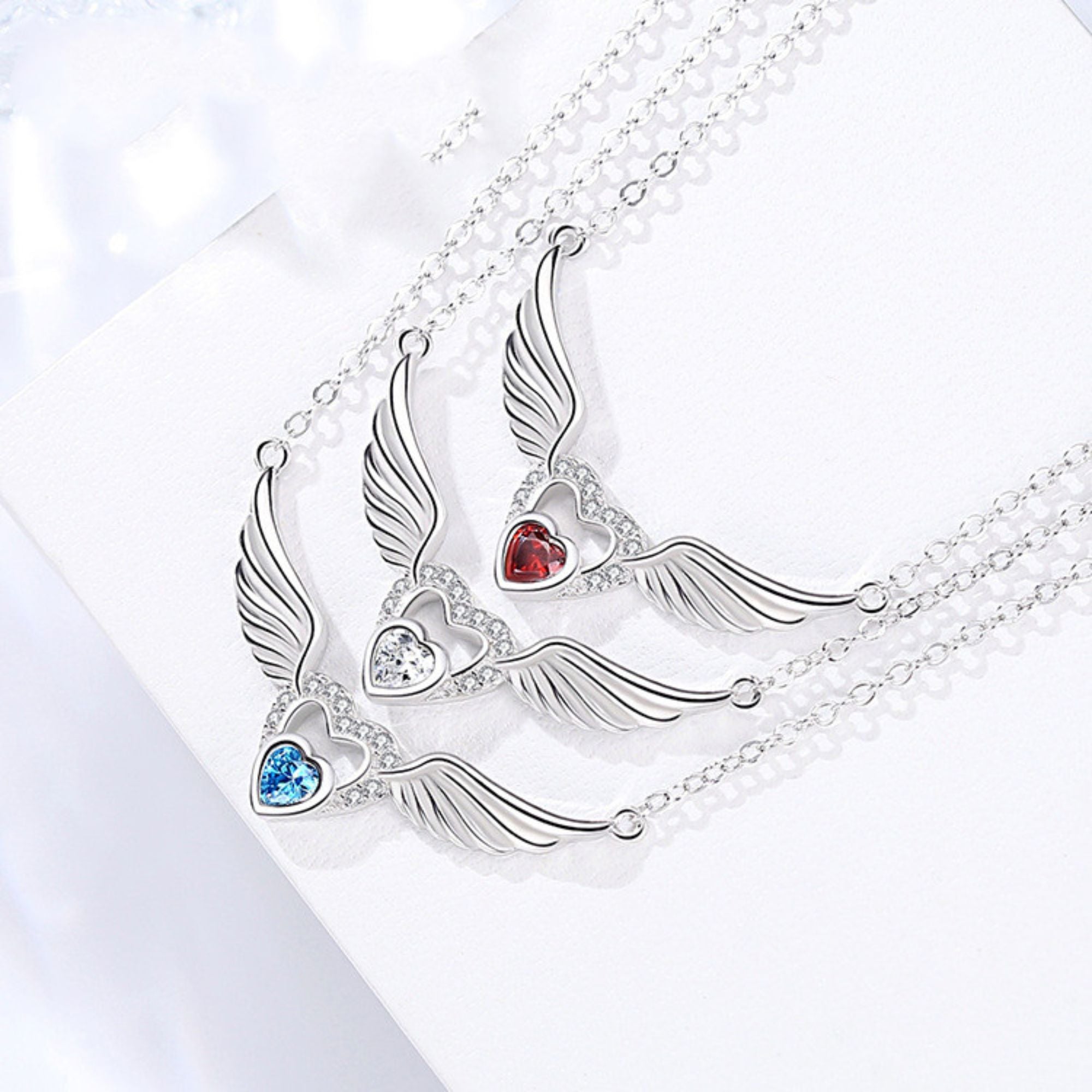 Angel Wings and Heart Sterling Silver Pendant - Clear, Blue or Red - Jesus Passion Apparel