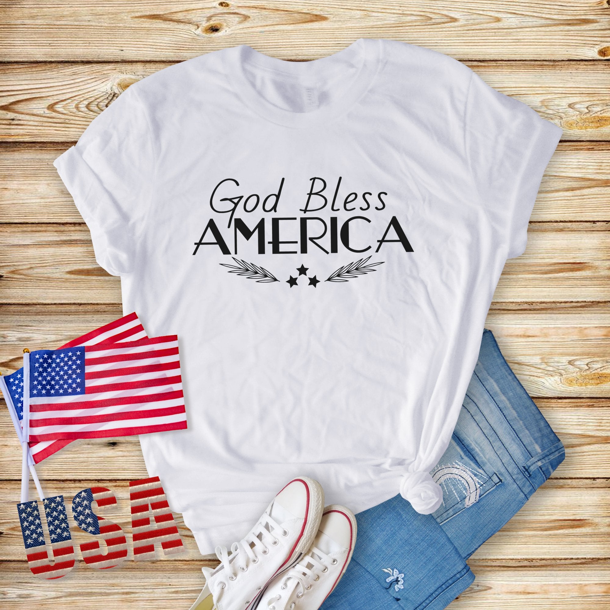 God Bless America Women's Short Sleeve Patriotic T-Shirt Size: XS Color: Baby Blue Jesus Passion Apparel