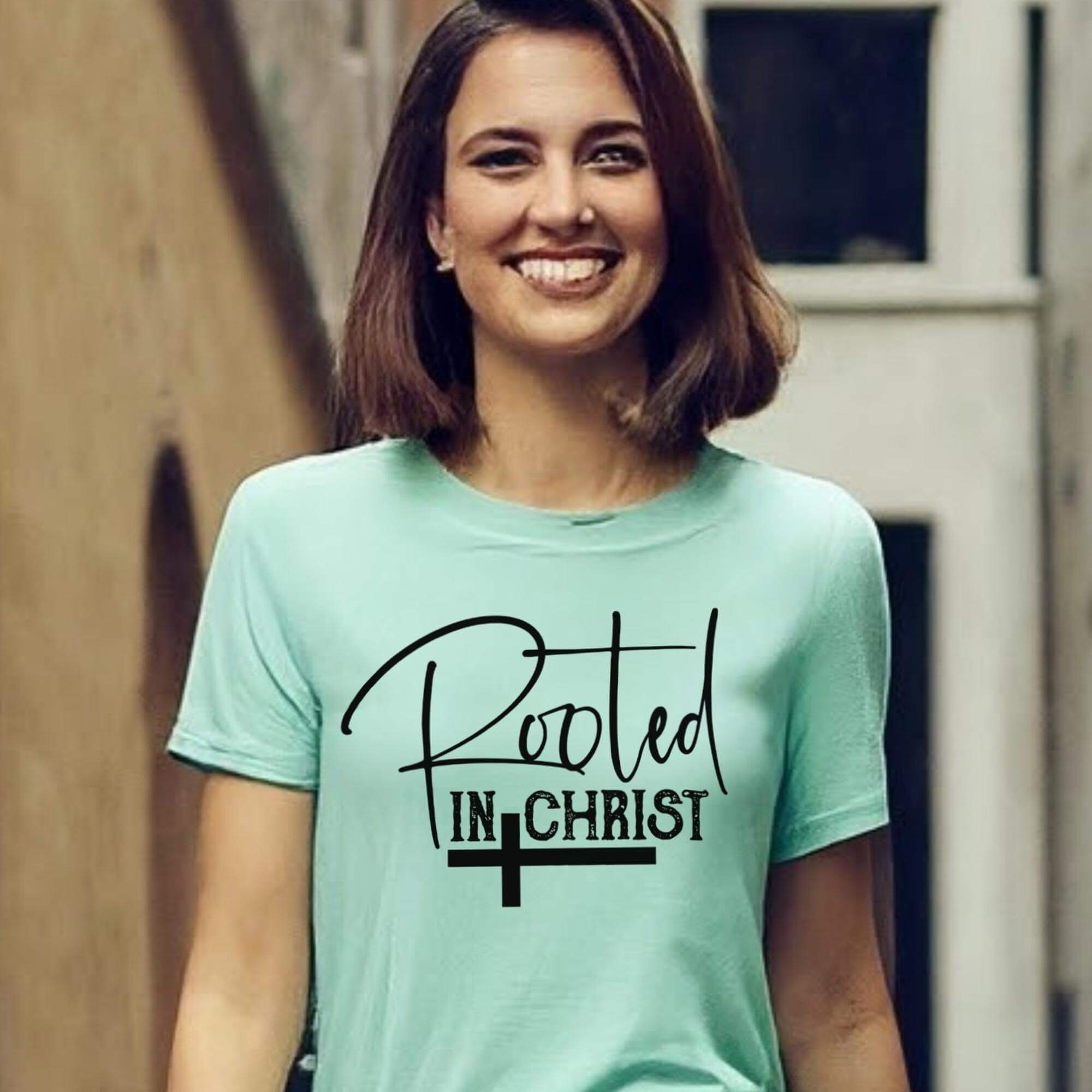 Rooted In Christ Women's Short Sleeve Tee Size: XS Color: Athletic Heather Jesus Passion Apparel