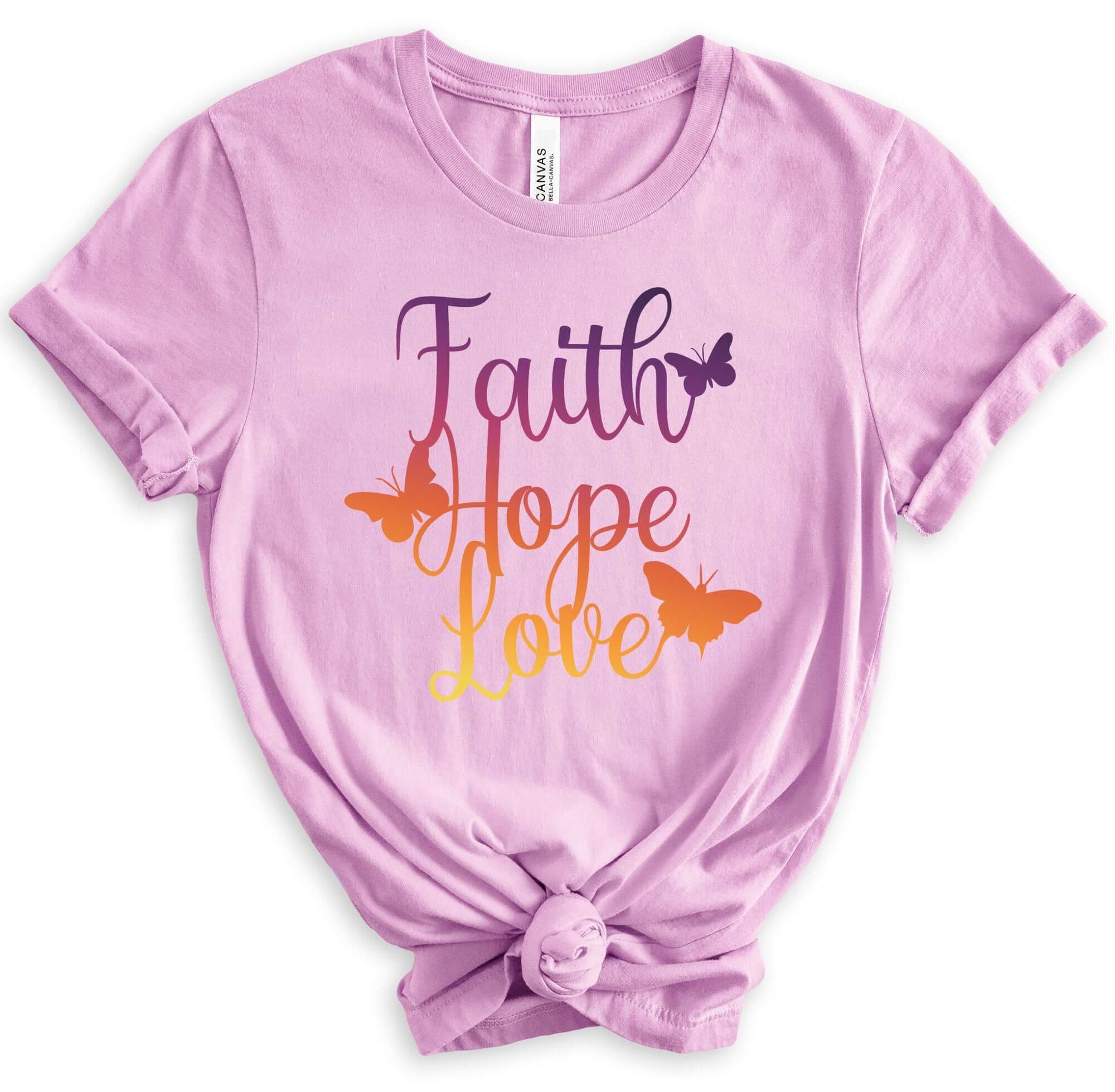 T-Shirts & TopsEmbrace a positive message with this vibrantly colored "Faith Hope Love" T-shirt, adorned with elegant butterflies. The rich gradients and inspirational words provide a daily dose of motivation, perfect for casual wear or as a thoughtful gi