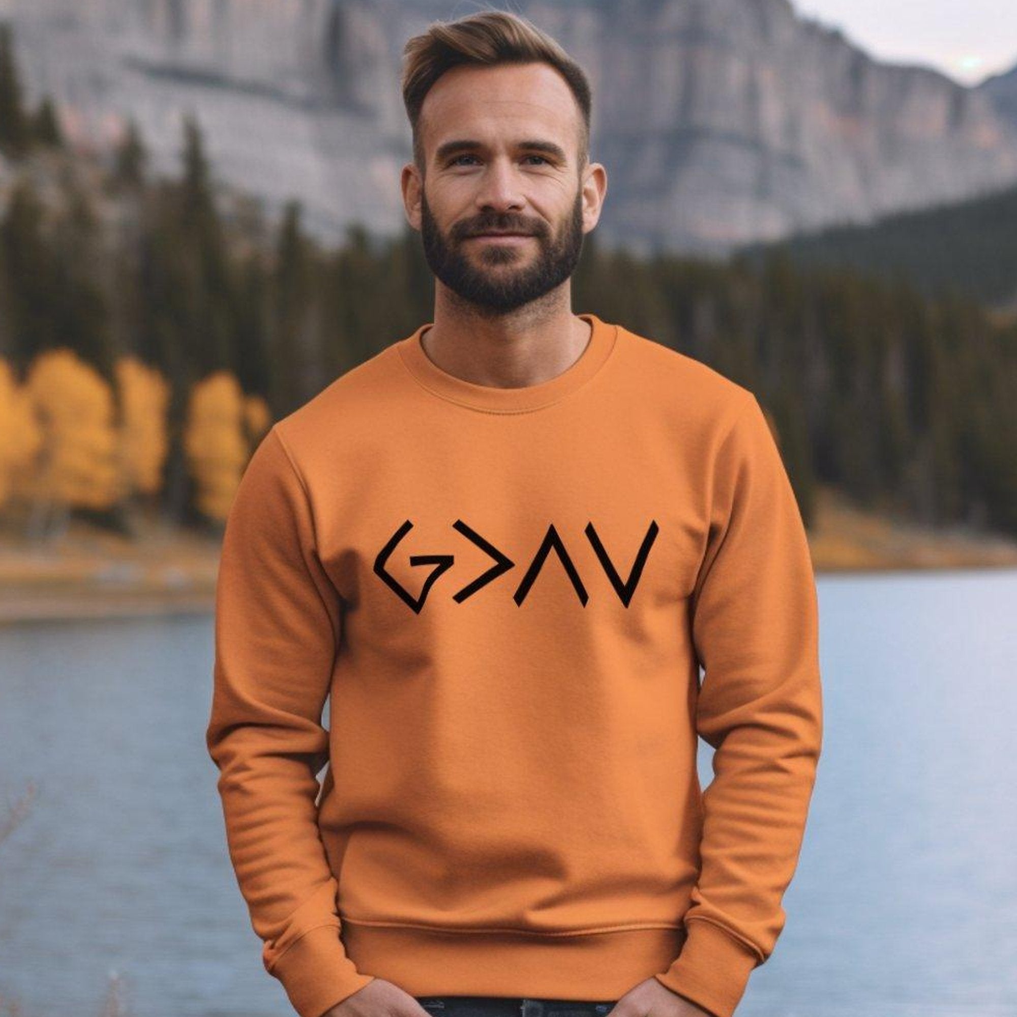 God is Greater Unisex Fleece Sweatshirt - Orange - Jesus Passion Apparel