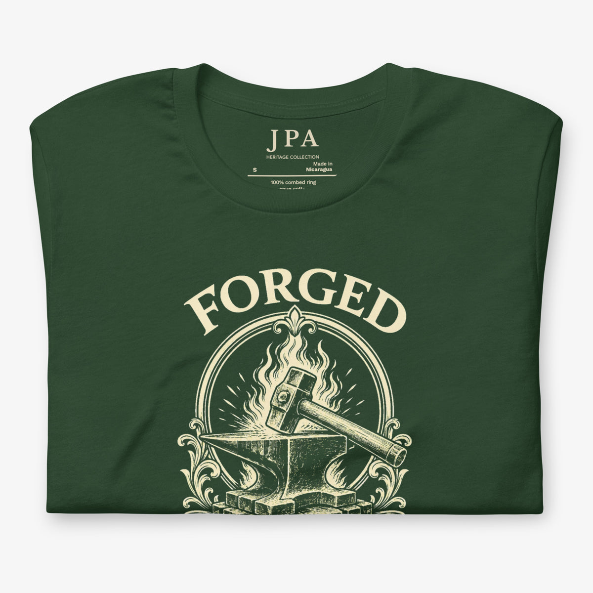 Folded view of Forged By Faith Tee.