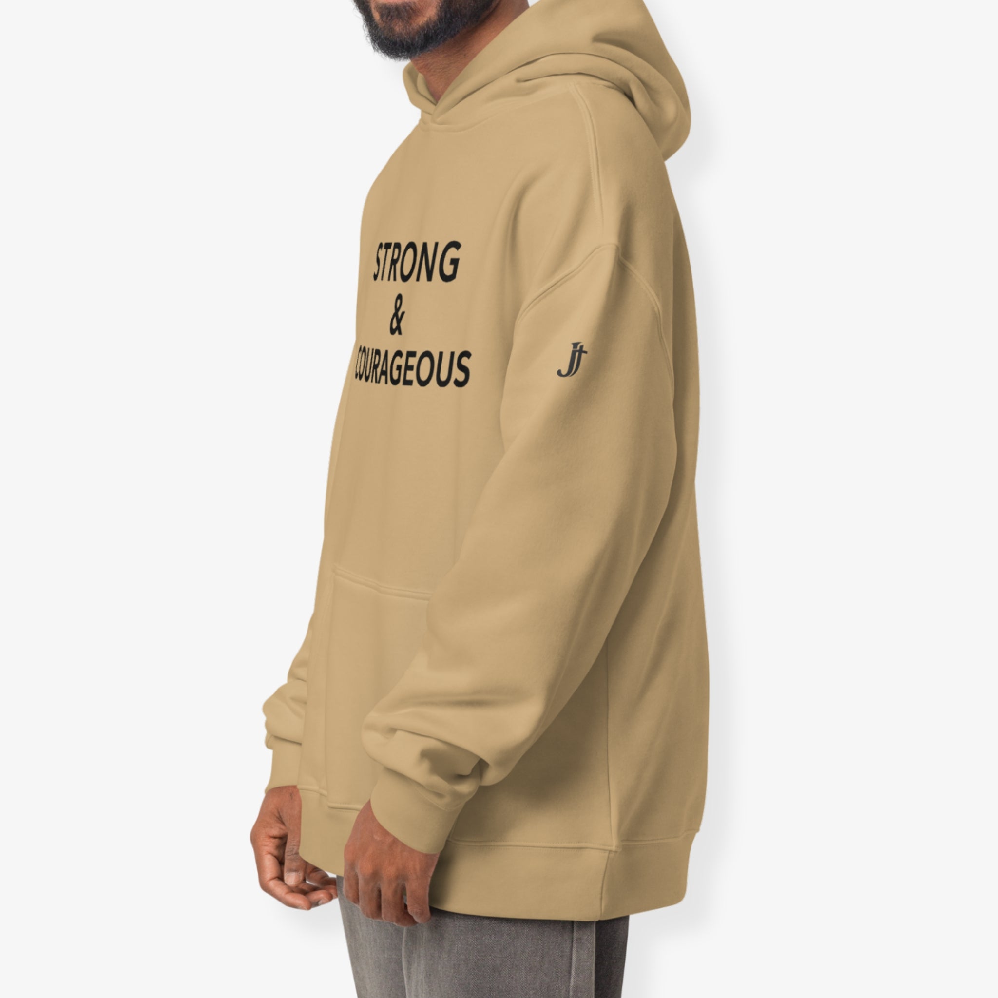 Beige hoodie with 'STRONG & COURAGEOUS' text on a white background