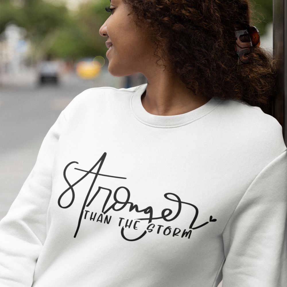 Stronger than the Storm Women's Fleece Unisex - Fit Sweatshirt Sand / White / Sport Grey - Jesus Passion Apparel