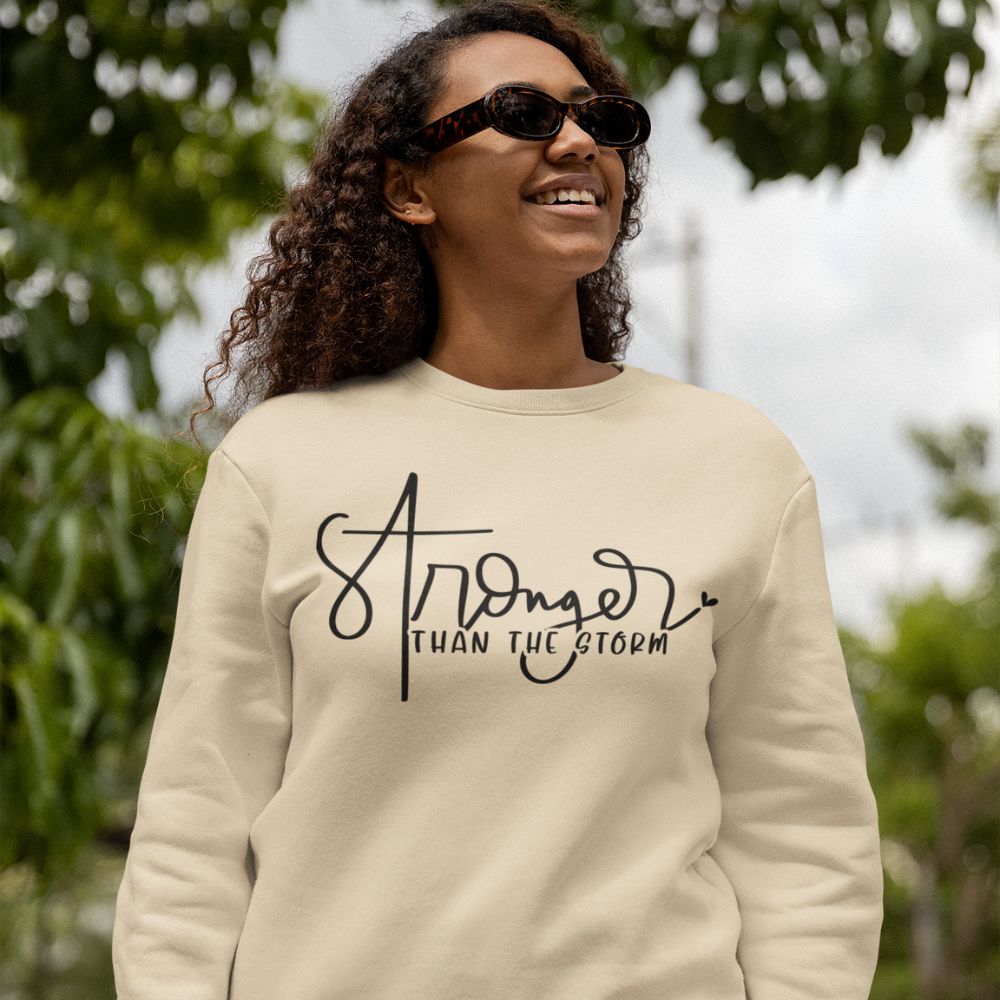 Stronger than the Storm Women's Fleece Unisex - Fit Sweatshirt Sand / White / Sport Grey - Jesus Passion Apparel