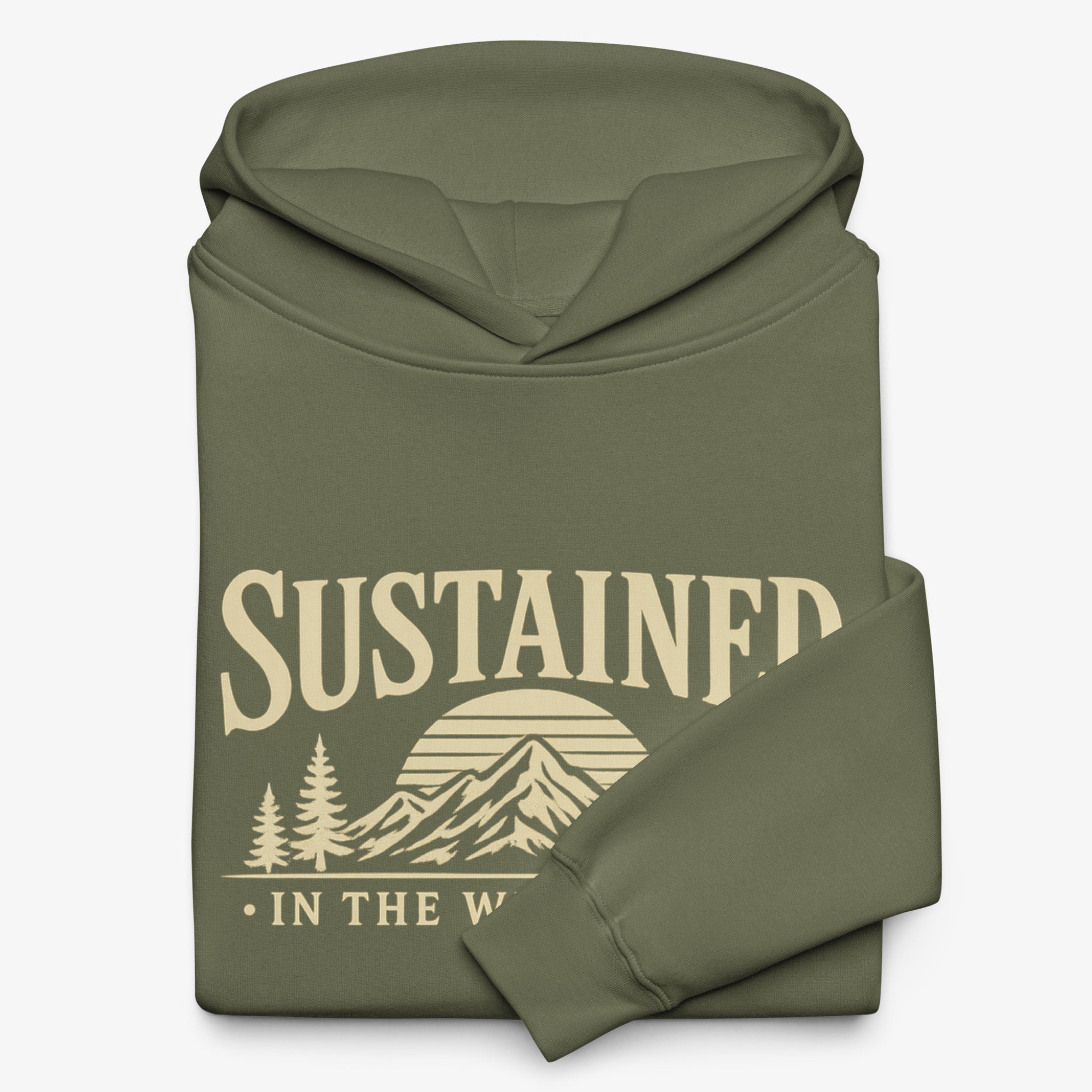 An olive green folded hoodie with a cream-colored graphic print on the front that reads 'SUSTAINED IN THE WILD' with a mountain and sun design, set against a plain light gray background.