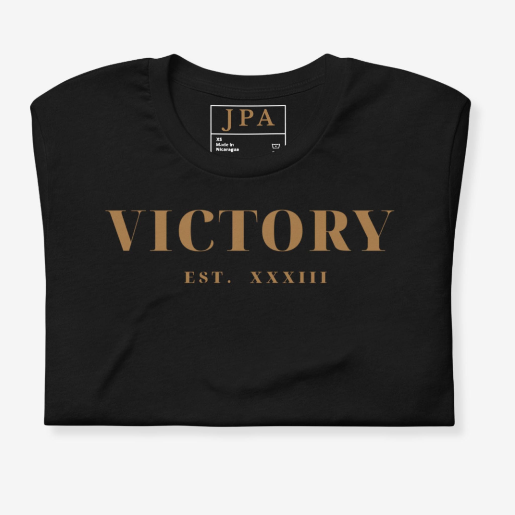 Black t-shirt with 'VICTORY EST. XXXIII' text and JPA logo on a white background